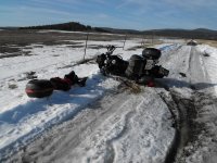 Motorcycle lying in snow.jpg