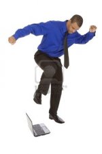 4080043-kicking-a-computer-on-white-background.jpg