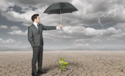 man-suit-holding-umbrella-fog.jpg