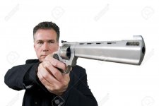 1228786-Mature-hansome-white-male-aiming-a-44-magnum-revolver-wearing-a-black-suite-isolated-on-.jpg