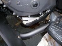 Plastic cover below oil plug.jpg