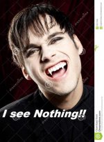 male-vampire-smiling-dangerously-showing-fangs-26311950.jpg