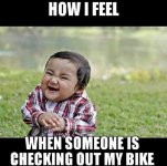 Checking out bike.jpg