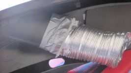 4 inch heater duct on fog light opening.JPG