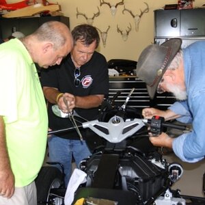 Cutting down the old handle bars in preparation for the riser kit!