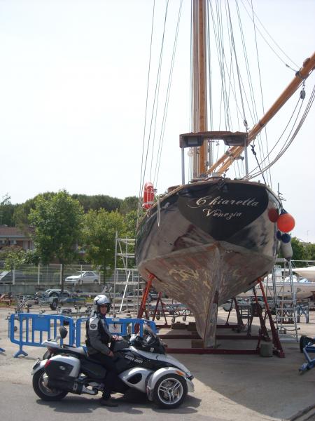 6 + in front of a military ship 15p