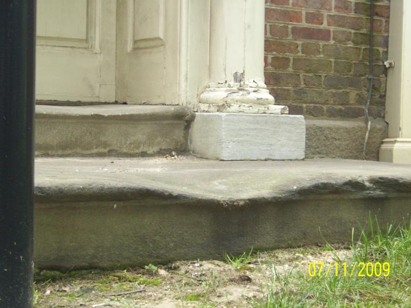 Concrete steps worn from footsteps.  Phili, PA