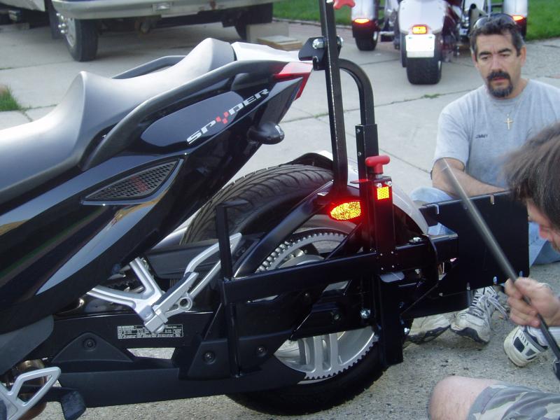 Mels installing hitch wheelchair rack